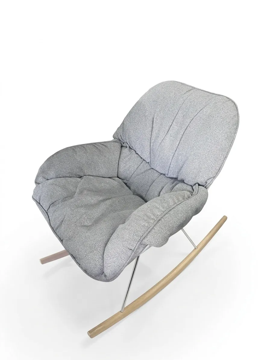 Sillón mecedor con almohadón