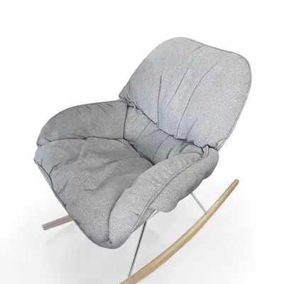 Sillón mecedor con almohadón